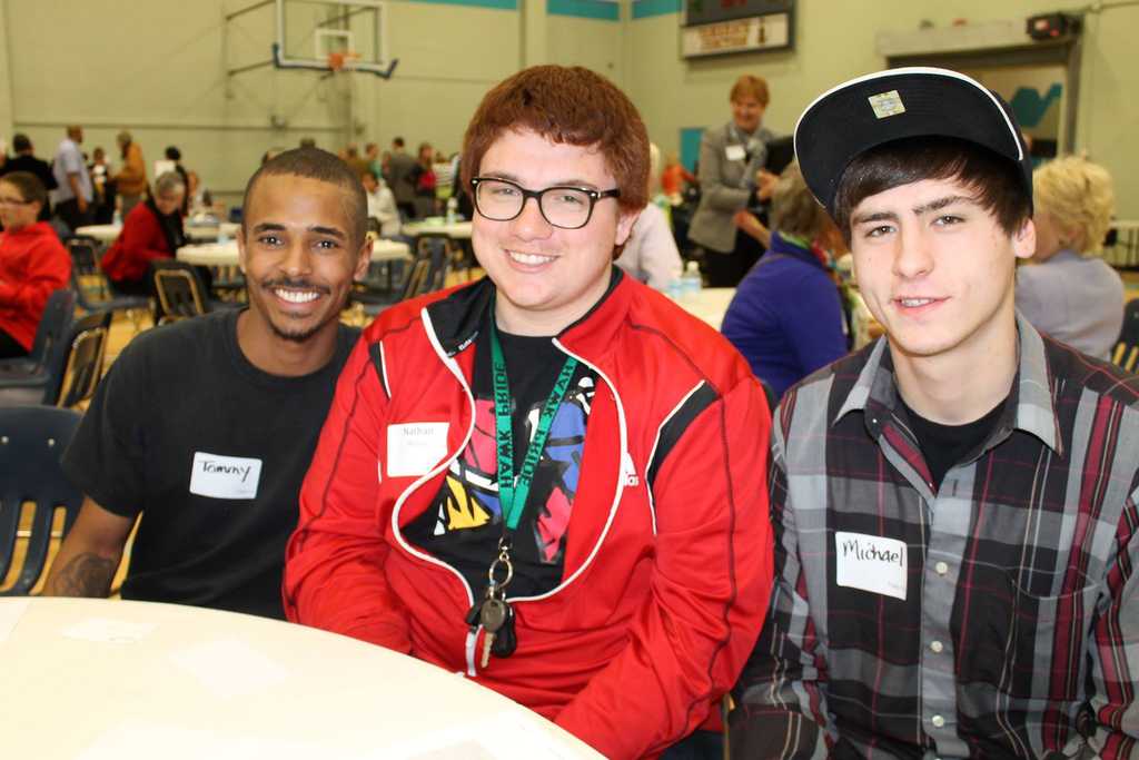 Three boys at an Eddy House celebration 